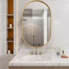 Armoire à miroir ovale dorée avec cadre métal, armoire murale à étagères réglables, rangement salle de bain, salon ou chambre