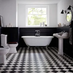 Baignoire ilot Charly blanche avec pieds patte d 'aigle chrome