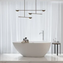 Baignoire îlot design en solid surface ovale HELSINKI 150 cm
