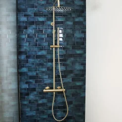 Colonne de douche thermostatique corps froid or brossé Essebagno Delice II