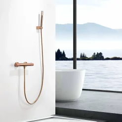 Mitigeur baindouche thermostatique en laiton et zama finition or rose PVD