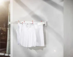 Séchoir à linge mural 8,1 m d'étendage, 8 barres et 1 porte serviettes, Leifheit Telegant 81 Protect Plus