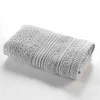 Serviette de toilette invite 30 x 50 cm Tendresse gris